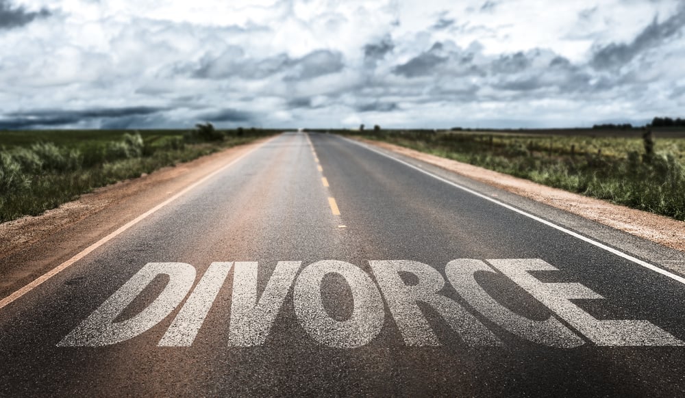Divorce written on rural road