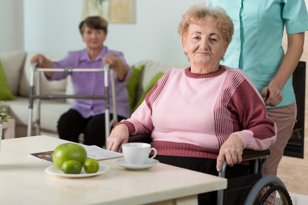 Older disabled woman on wheelchair in nursing home-1